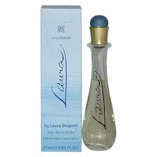 a bottle of perfume sitting next to a box